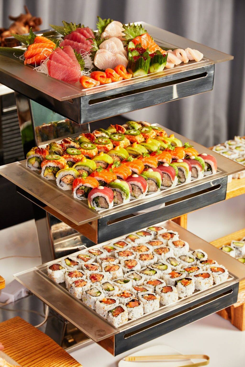 Tiered sushi and sashimi display platter